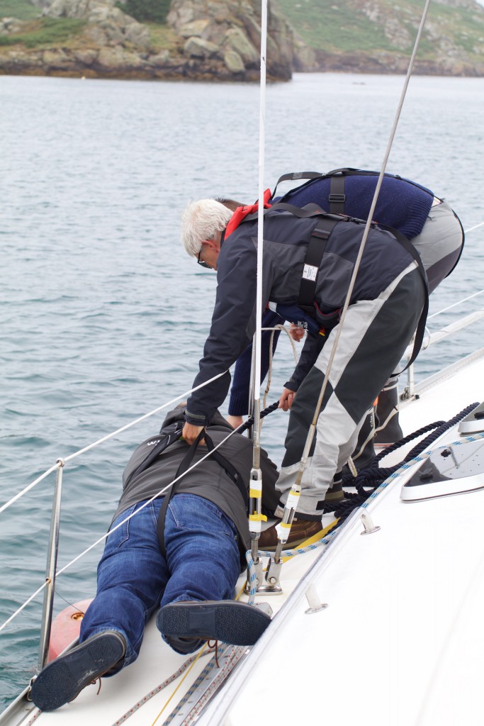 Hanging off the side to make sure we had a full round turn on the mooring buoy